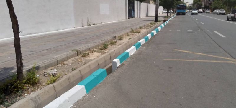 محور خیابان های مهران و شهید صمدی منطقه 19 با رنگ آمیزی 5 هزار متر مربع جدول نونوار شد