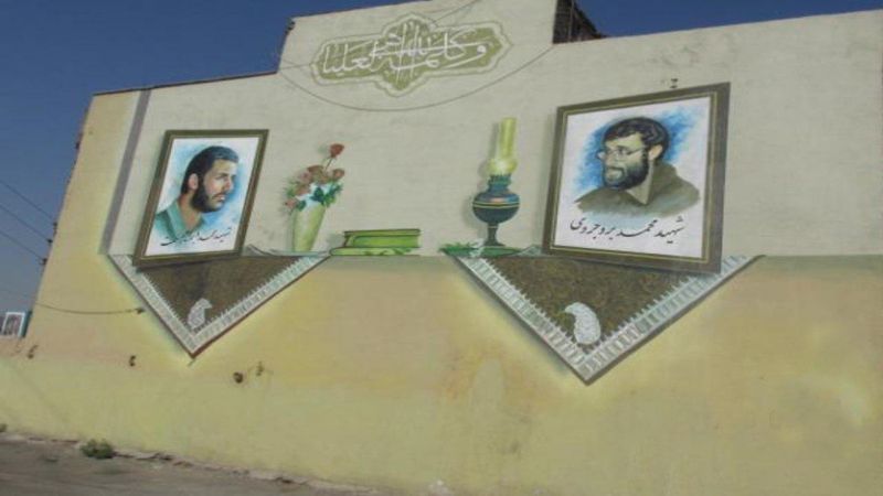  بازسازی نقاشی دیواری شهیدان همت و طاهری در منطقه 15